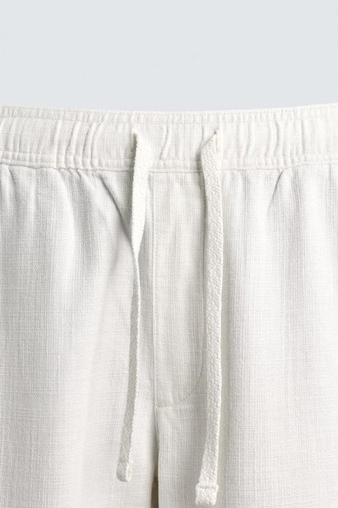 ZARA RELAXED FIT TROUSERS WITH A TEXTURED TEXTURE | OFF WHITE