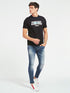GUESS - NINETEEN EIGHTYONE EDITION REGULAR FIT T-SHIRT | BLACK