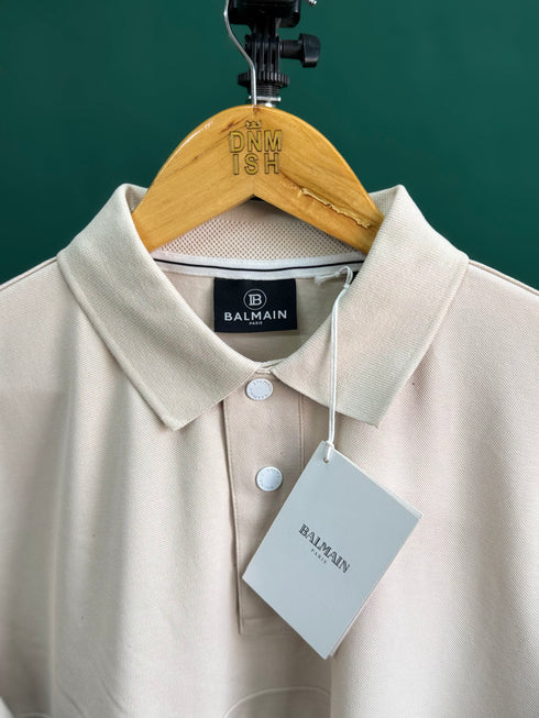 BALMAIN TEXT REVERSE EMBROIDERY POLO SHIRT | CREAM
