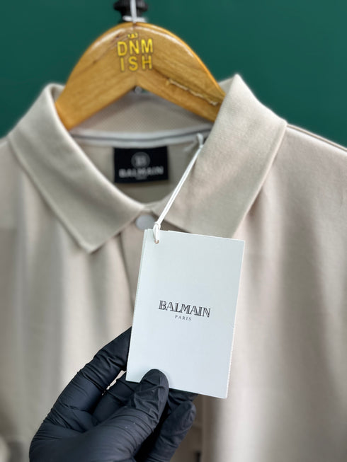 BALMAIN TEXT REVERSE EMBROIDERY POLO SHIRT | CREAM