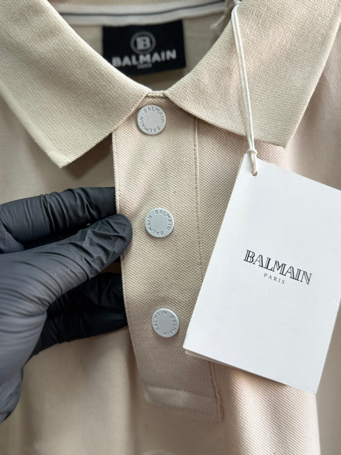 BALMAIN TEXT REVERSE EMBROIDERY POLO SHIRT | CREAM