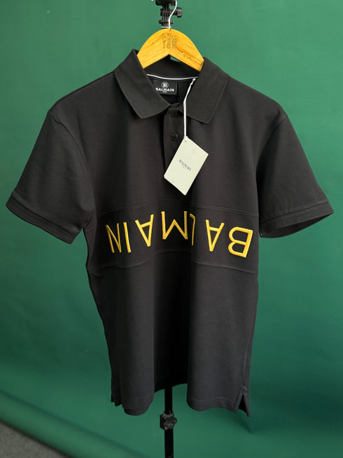 BALMAIN TEXT REVERSE EMBROIDERY POLO SHIRT | BLACK