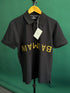 BALMAIN TEXT REVERSE EMBROIDERY POLO SHIRT | BLACK