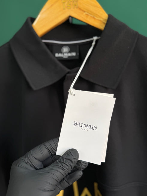 BALMAIN TEXT REVERSE EMBROIDERY POLO SHIRT | BLACK