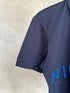 BALMAIN TEXT REVERSE EMBROIDERY POLO SHIRT | NAVY BLUE