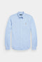Men’s Polo Ralph Lauren knit Oxford shirt – a versatile and elegant wardrobe choice.