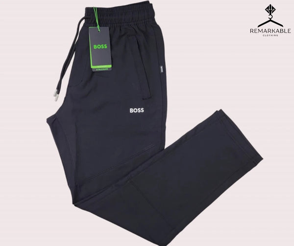 Dark navy Hugo Boss men's trousers, stylish and comfortable fit.