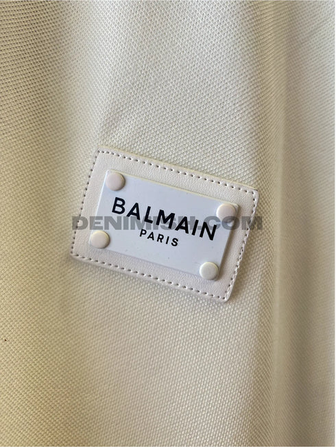 Balmain premium white men's polo shirt with a classic design.