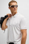 HUGO BOSS white polo shirt with logo, stretch cotton, premium fit.