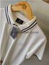 Balmain premium white men's polo shirt with a classic design.