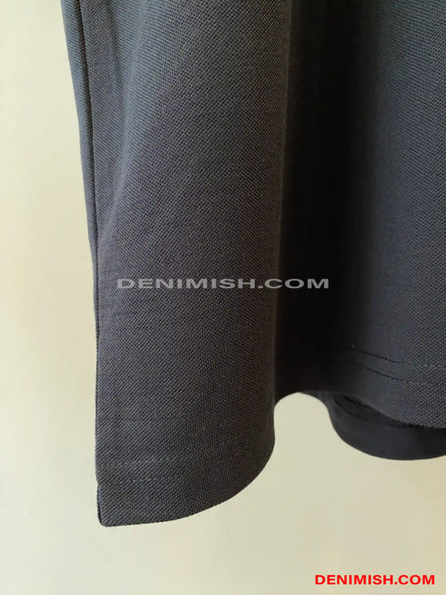 Balmain premium dark blue men's polo shirt with a classic design.