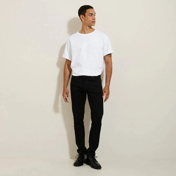Jules UrbanFlex slim fit jeans in black for men.