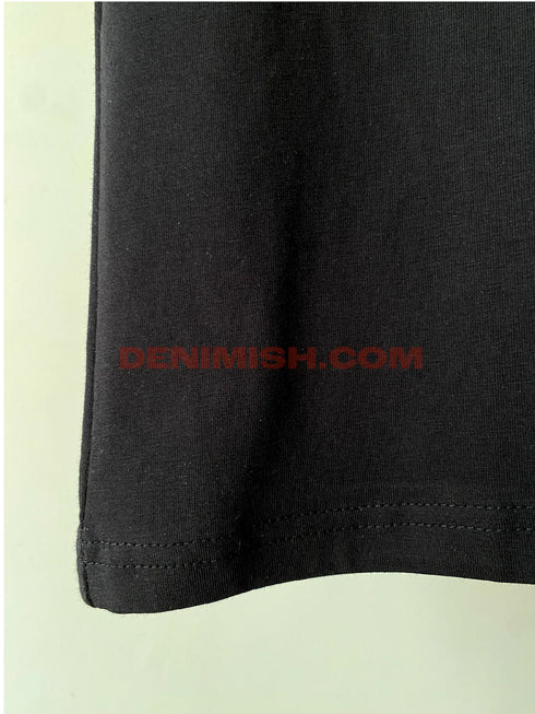 Balmain Paris premium black men's t shirt with a sleek round neck design.