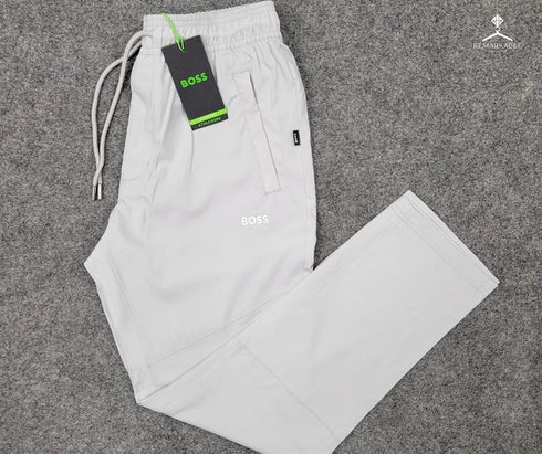 Light grey Hugo Boss men's trousers, stylish and comfortable fit.